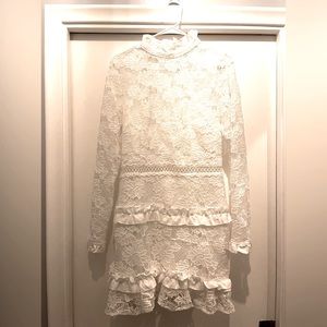 White party? This is the perfect lace mini dress
